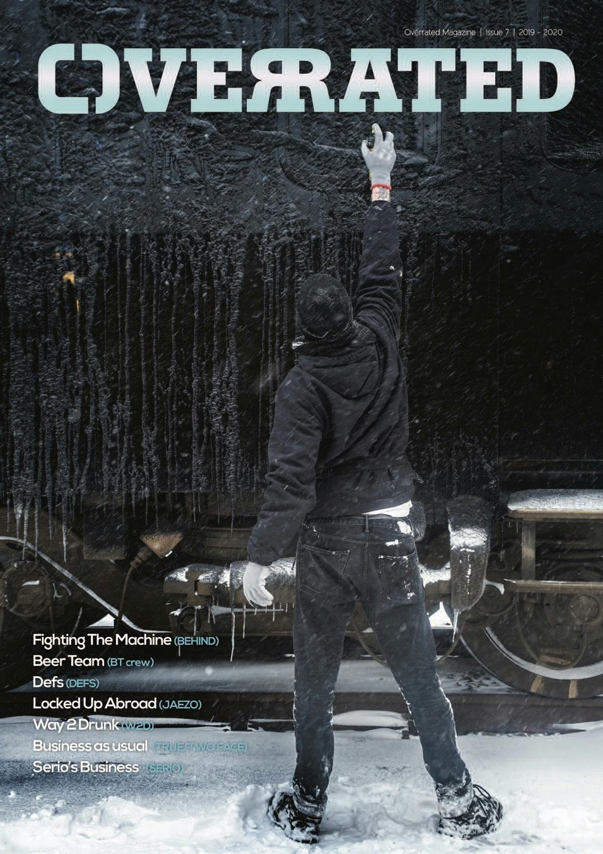 The cover of overrated magazine issue #7 showing someone in the snow spraypainting a frozen train black